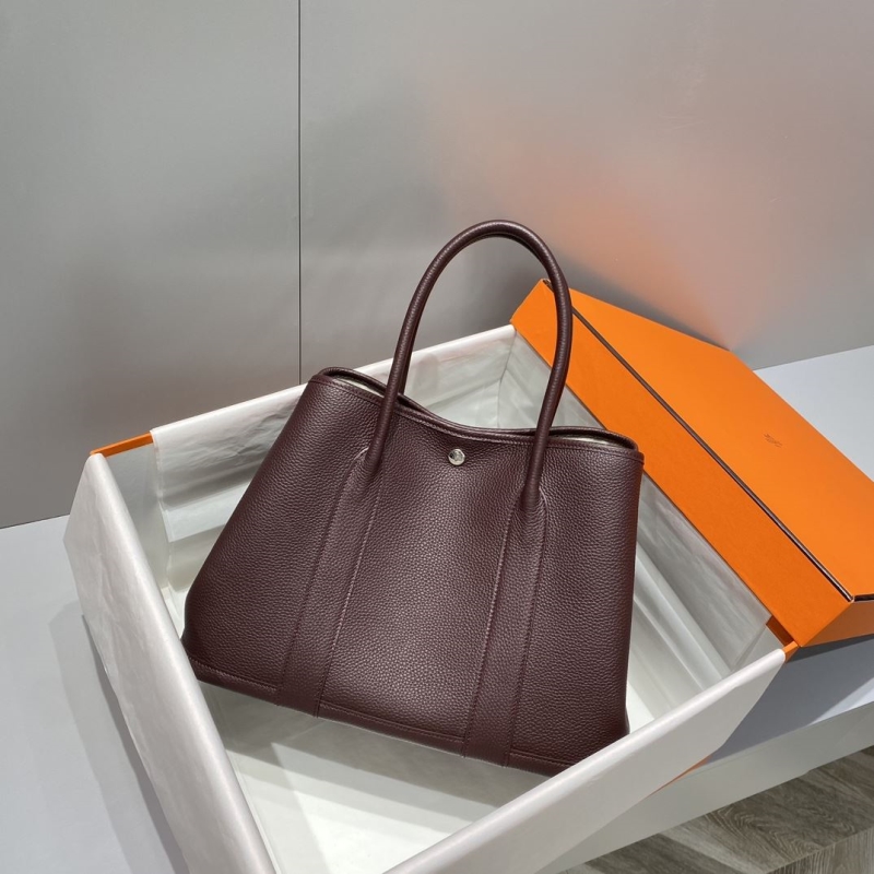 H**mes shopping bags